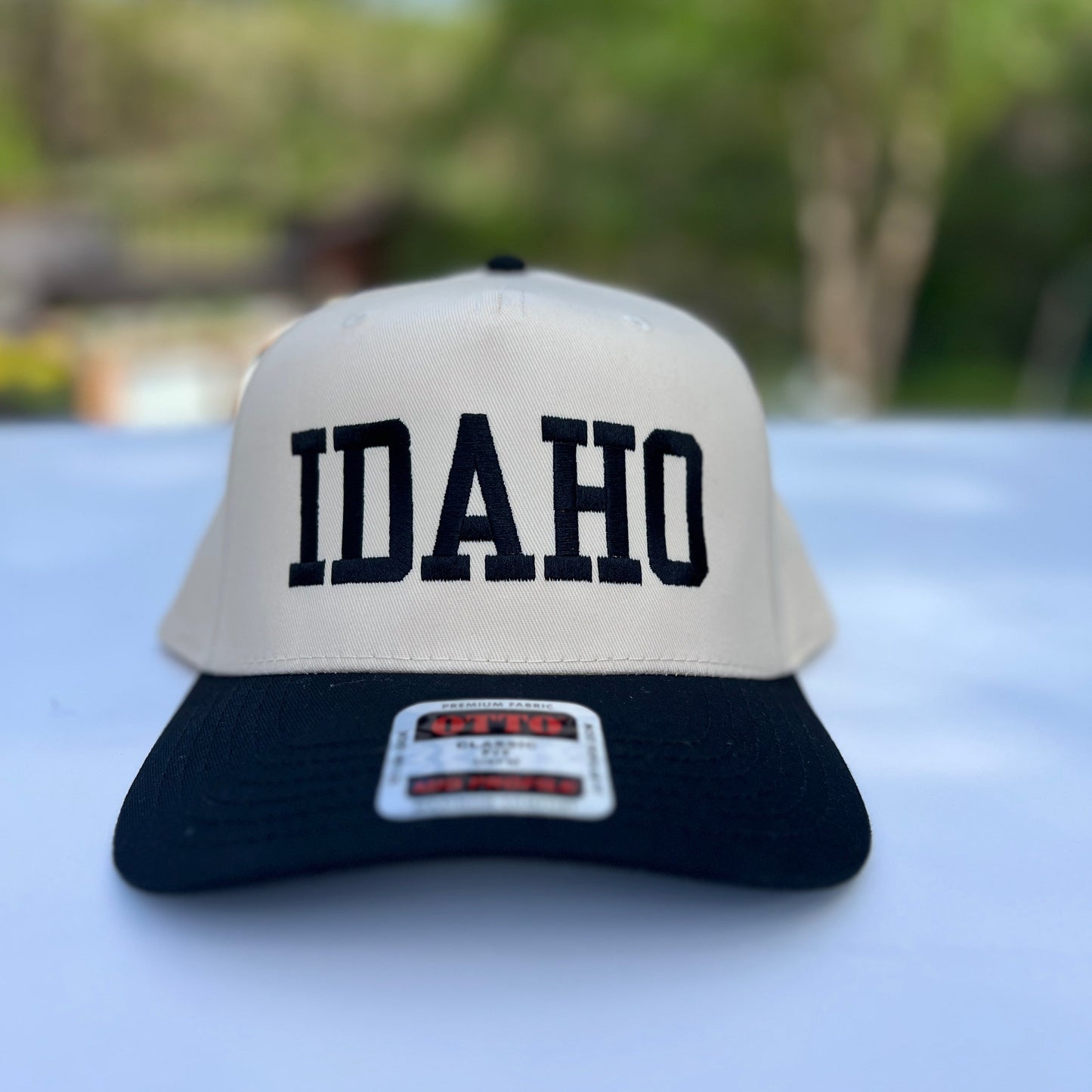 This Idaho Hat says idaho on it. Plain, simple text on a classic style hat. Idaho Hats, designed by TatorJo
