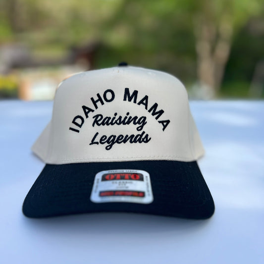 This Idaho Hat has the words Idaho Mama Raising Legends on it. This hat is black and natural colors. Designed by TatorJo an Idaho Apparel Company.