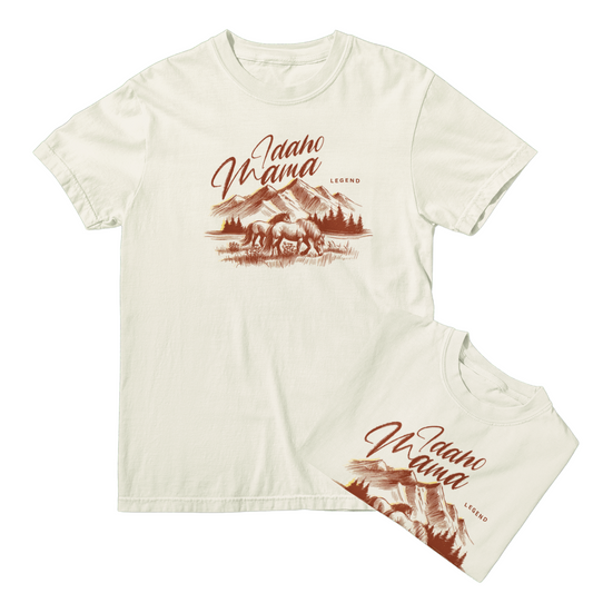 Idaho Mama T Shirt with horses on it and the word Legend. This Idaho Mama tee comes in ivory and a brown/red print. This design is designed and printed by TatorJo, an Idaho Apparel Company