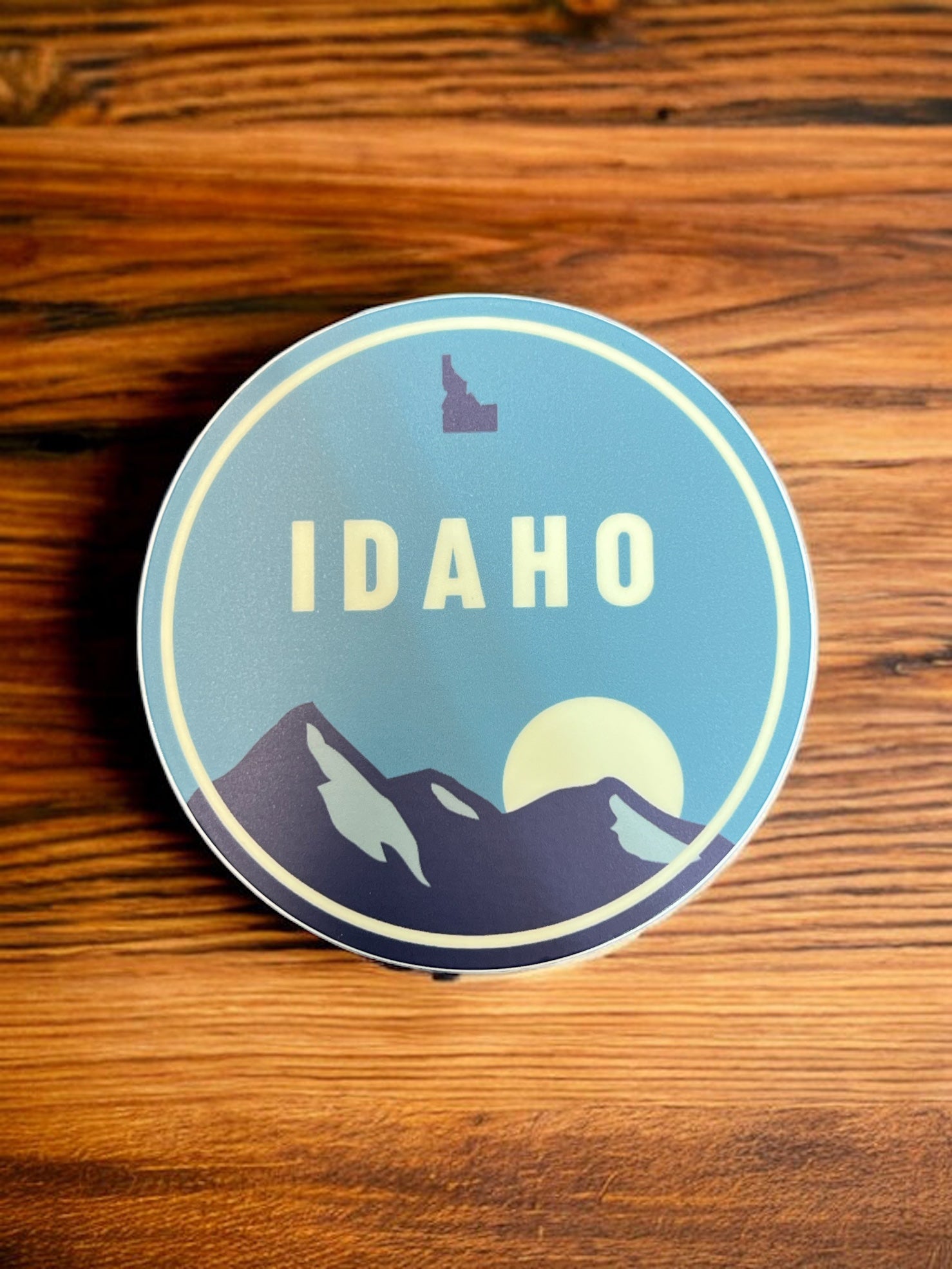 Idaho Sticker. Idaho mountain sticker. Idaho Night Mountain Sticker. Idaho Nights with moon over the mountains. Idaho blue sticker. Idaho nighttime. Idaho adventure stickers.