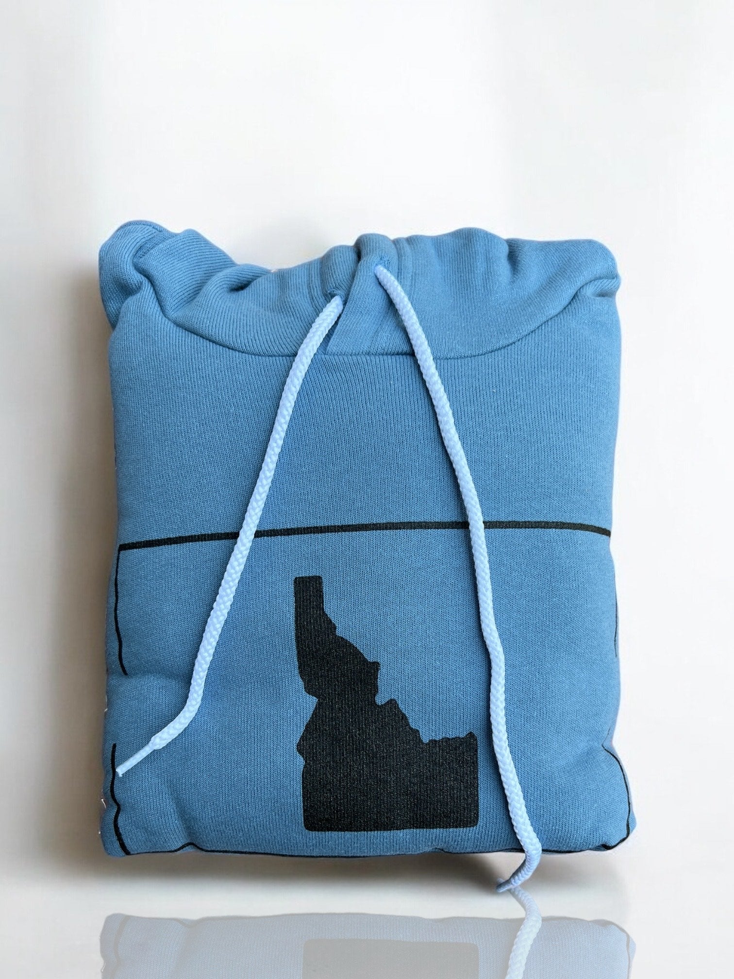 This blue hoodie has a simple Idaho design on the front. This Idaho sweatshirt is ultra soft and so cozy